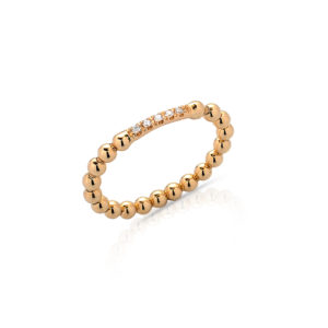 ANELLO FLESSIBILE FATTO CON PALLINE D'ORO, CENTRO INCASSATO IN BRILLANTI