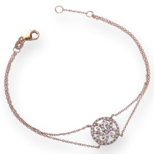 BRACCIALE CON DOPPIA CATENA E FREGIO TONDO CENTRALE INCASSATO IN BRILLANTI